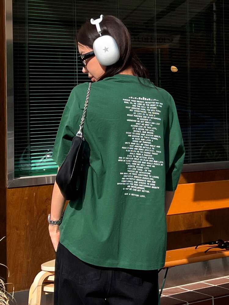 T-shirt oversize à épaule dénudée avec slogan graphique