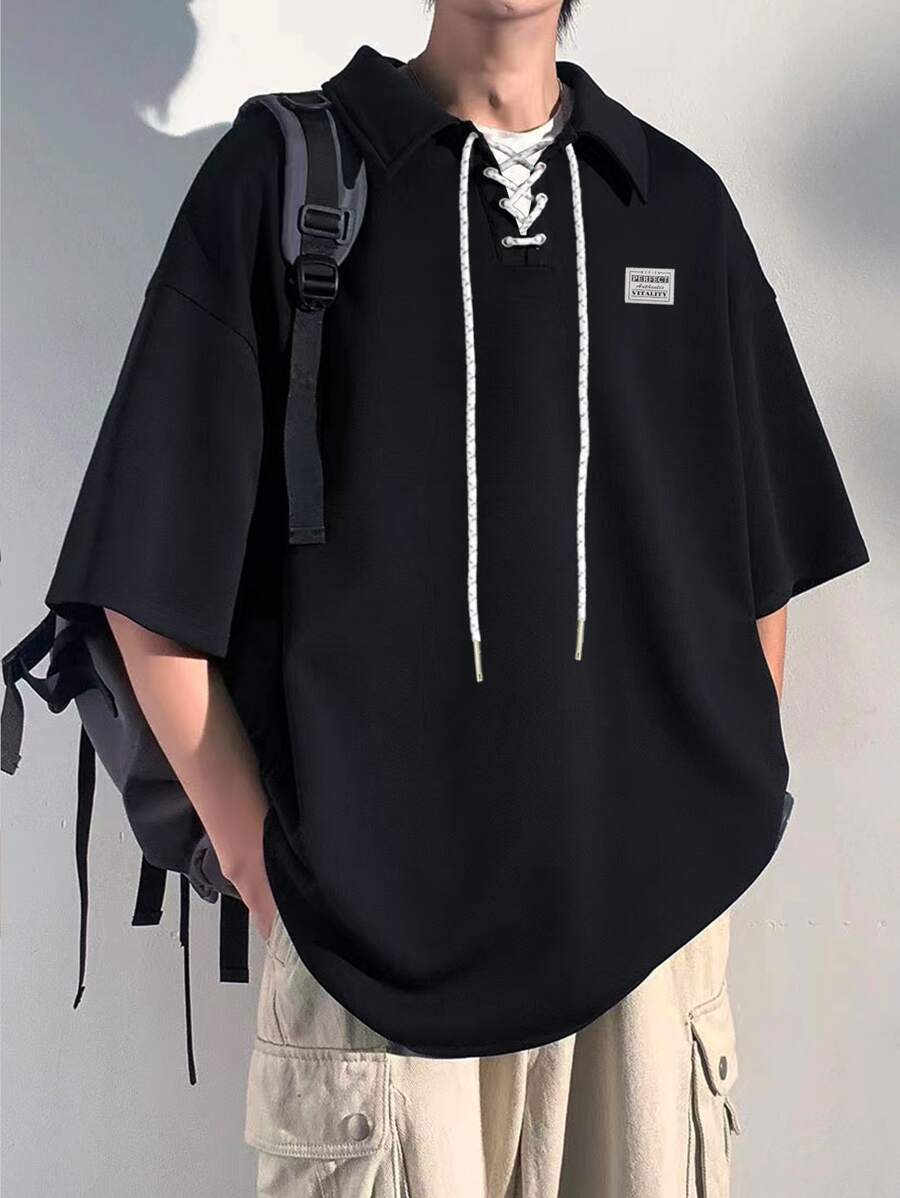 Manfinity Hypemode Loose Fit Men's Polo Shirt With Letter Patchwork, Lace-Up Front And Drop Shoulders - Black - View 1