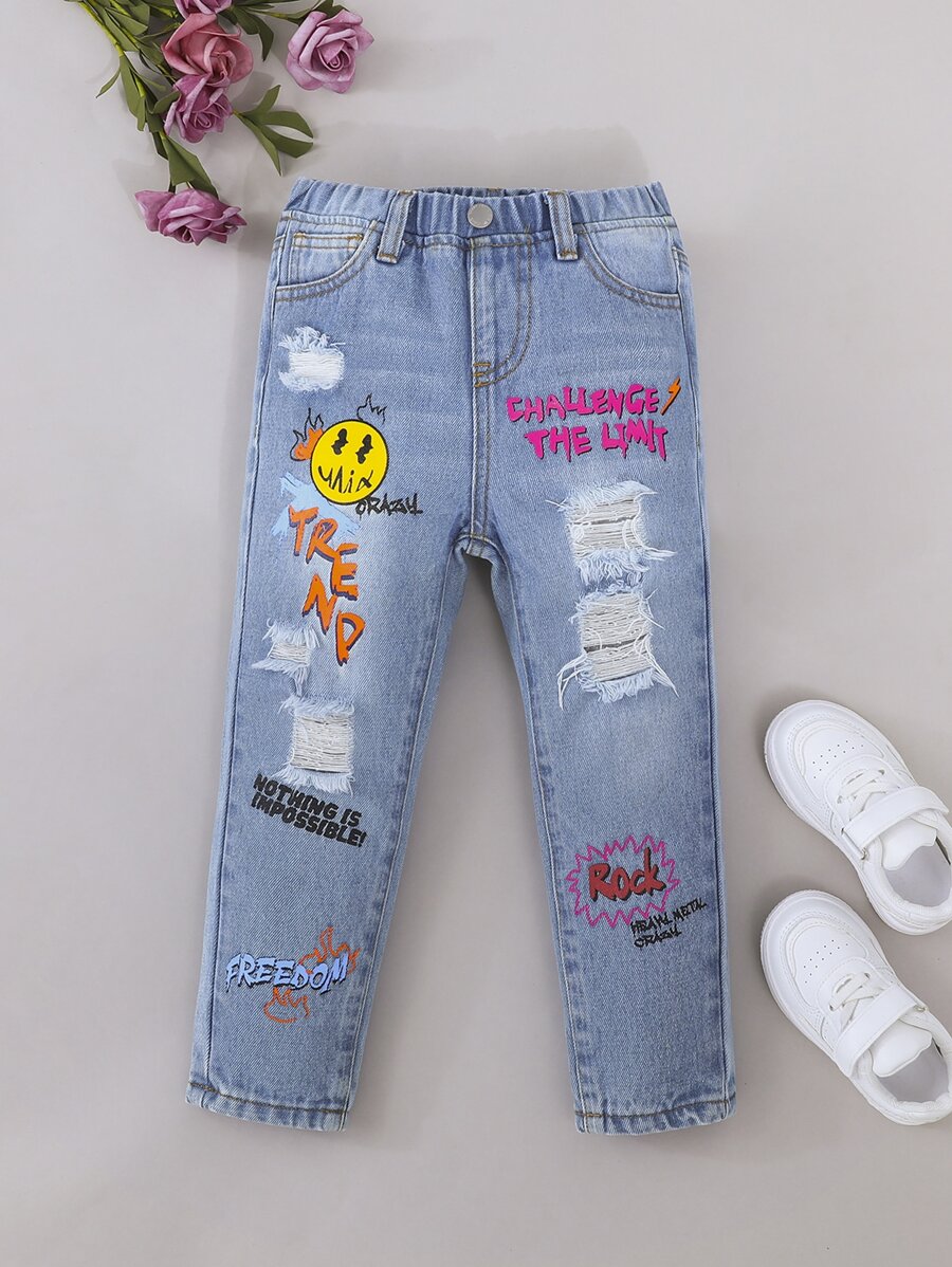 SHEIN Young Girl Cartoon & Slogan Graphic Ripped Jeans - Light Wash - View 1