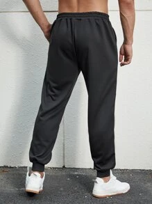 Manfinity EMRG 男士卡通圖案腰部抽繩衛褲 - 黑色 - 查看 3