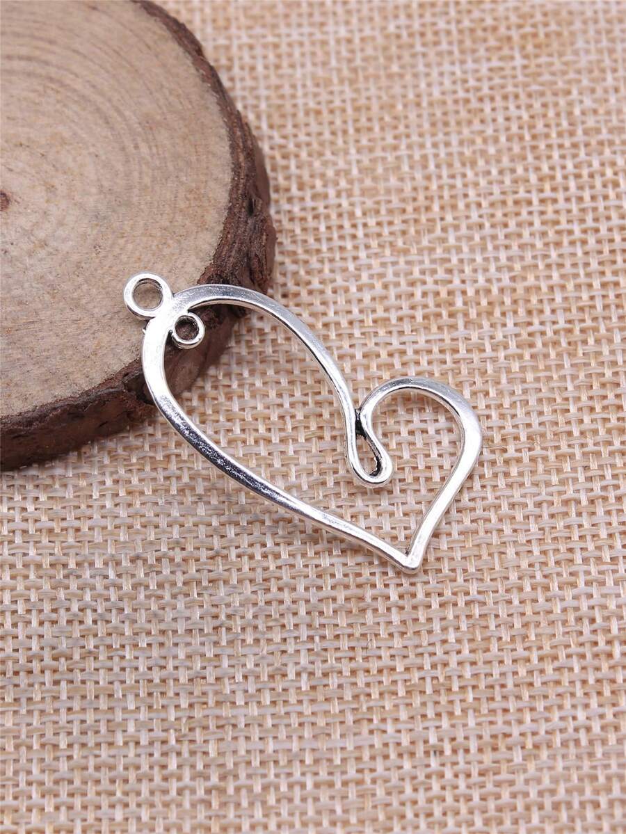 10入組41x20毫米古銀色空心心型吊飾