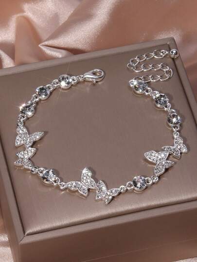 Pulsera con diamante de imitación con diseño de mariposa