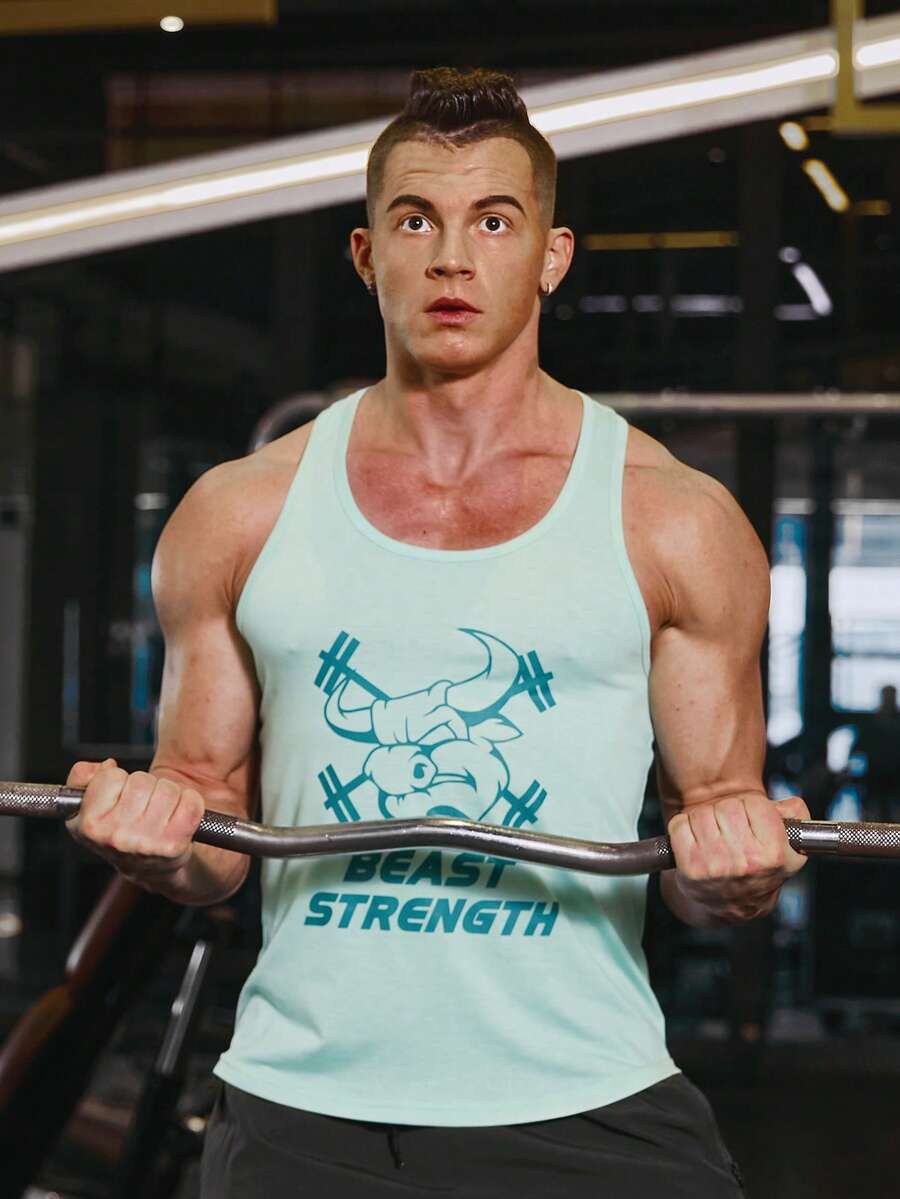 Manfinity Sport Corelite Camiseta de tirantes deportiva para hombres con diseño de personajes animados y gráficos de letras - verde menta - Ver 1