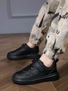 Giày trượt patin thể thao cho bé trai, Giày thể thao có dây buộc móc và vòng - màu đen - Xem 1