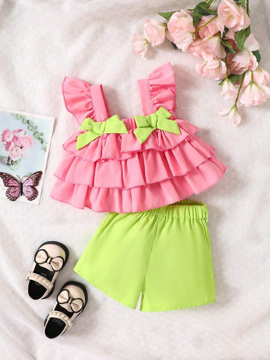 Top De Tirantes Para Bebés Con Lazo Delantero Y Detalle De Volantes En El Borde Y Shorts