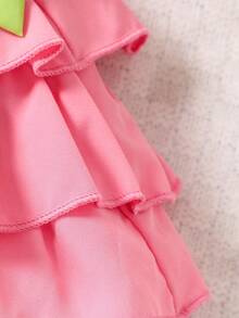 Top De Tirantes Para Bebés Con Lazo Delantero Y Detalle De Volantes En El Borde Y Shorts