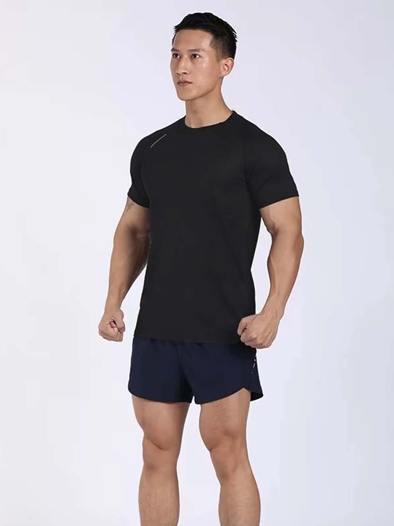 Manfinity Sport Corelite Camiseta deportiva de manga raglán de color sólido para hombres, parte superior transpirable para gimnasio - Negro - Ver 1