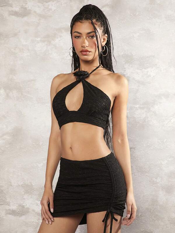 Alix Earle Celebrates Her College Graduation in a Strappy Cutout Skirt Set