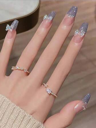 24入組長形棺材藍色閃粉3D蝴蝶結裝飾假指甲和1入組指甲文件和1張膠片壓光指甲，指甲用品