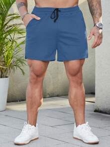 Manfinity Homme Quần Short Nam Dây kéo Túi Chia màu trơn Giải trí - Màu xanh lam - Xem 5