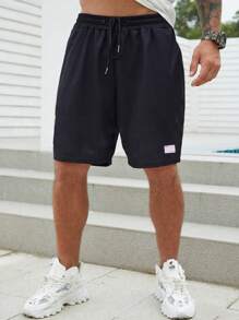 Manfinity Homme Shorts de talla grande para hombre con parche de letras, cintura con cordón, diseño de personaje liso en diferentes tallas - Negro - Ver 4