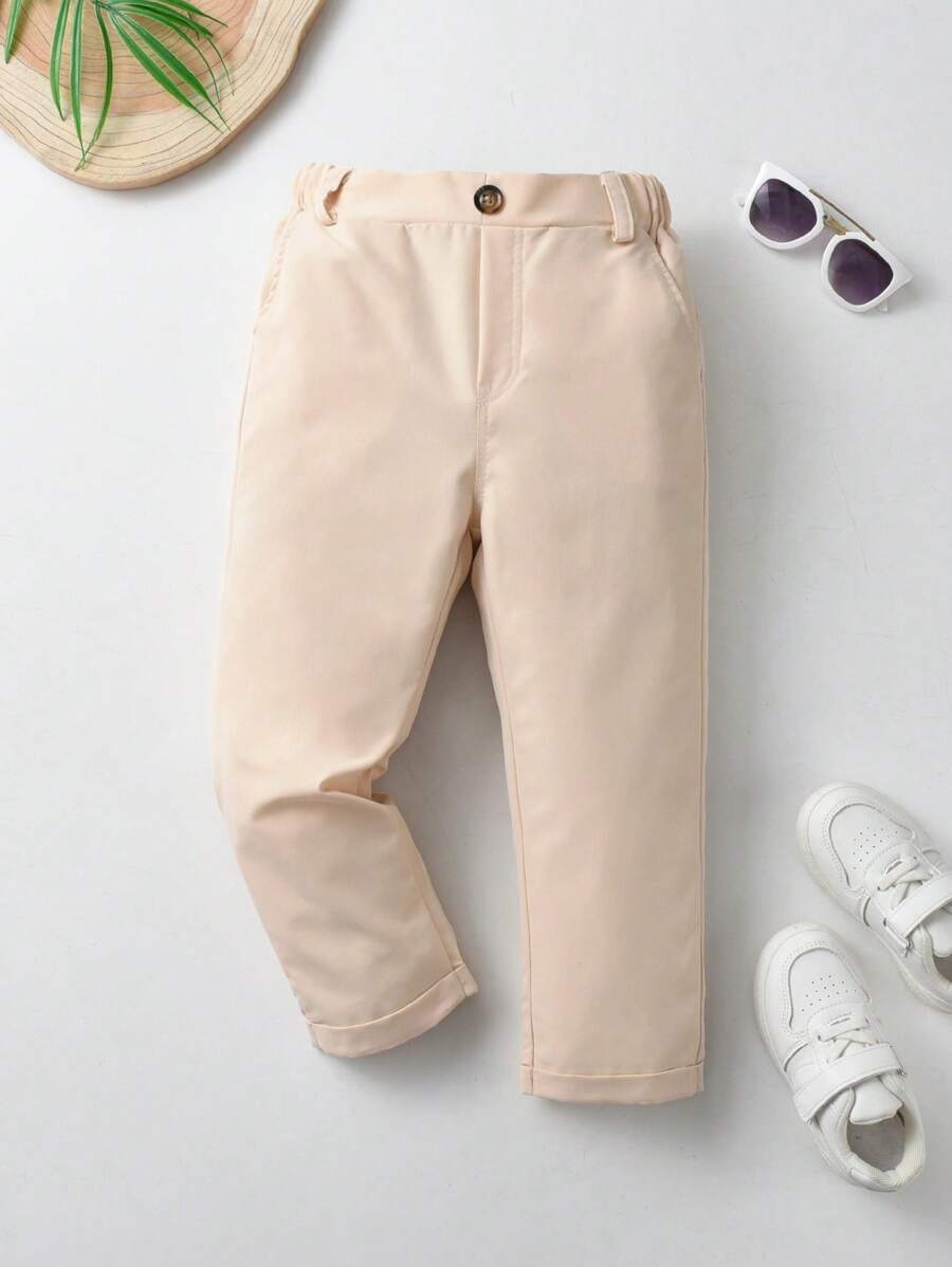 SHEIN Boy Casual Relaxed Solid Color Pants With Button Decoration And Slant Pockets, Elastic Waist Design Suitable For Daily Wear, Travel, Party, Holiday, Fashion Versatile - Khaki - View 1