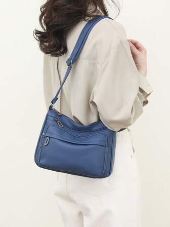 荔枝紋壓花流浪包前口袋可調整肩帶適用於日常