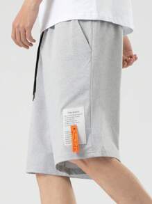 Manfinity Hypemode Men Slogan Graphic Patched Shorts - Grey - View 3