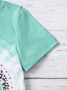 Tricou și pantaloni scurți cu grafic pentru fete mici și curcubeu