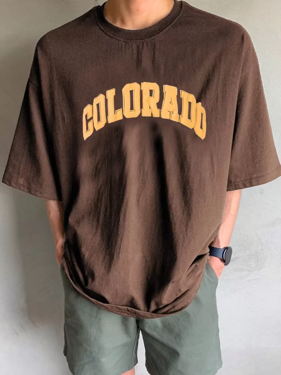 DAZY Đàn ông trở lại trường học bằng vải cotton có họa tiết thả vai - màu nâu - Xem 1