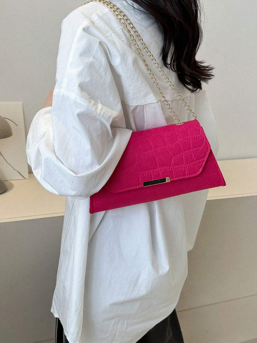 中等翻蓋法棍包壓花細節金屬裝飾螢光紅前衛