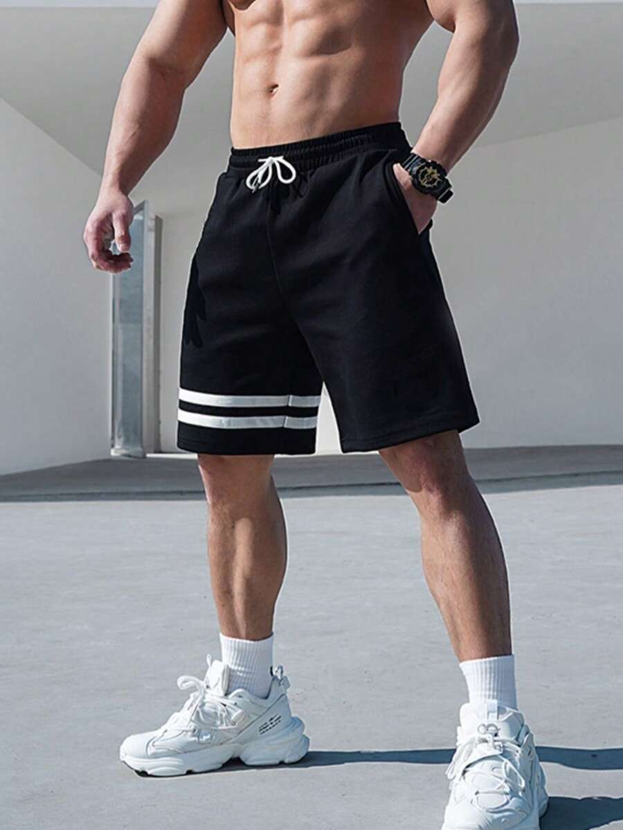 Manfinity Running Shorts deportivos estilo novio para hombres, con rayas y cordón en la cintura para el gimnasio - Negro - Ver 1
