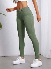 SHEIN Essnce Jeans ajustados unicolor