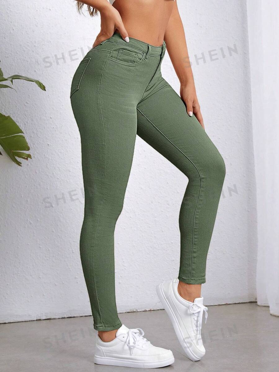 SHEIN Essnce Jeans ajustados unicolor