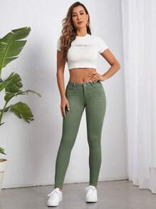 SHEIN Essnce Jeans ajustados unicolor