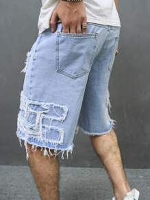 Manfinity EMRG Short en jean ample pour hommes avec effiloché, déchiré et bordure brute. Short en jean de fête bleu clair, parfait pour les cadeaux pour le mari ou le petit ami
