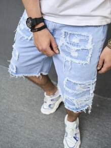 Manfinity EMRG Short en jean ample pour hommes avec effiloché, déchiré et bordure brute. Short en jean de fête bleu clair, parfait pour les cadeaux pour le mari ou le petit ami