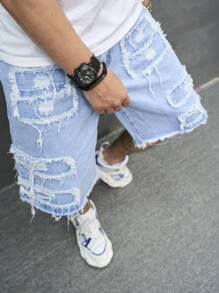 Manfinity EMRG Short en jean ample pour hommes avec effiloché, déchiré et bordure brute. Short en jean de fête bleu clair, parfait pour les cadeaux pour le mari ou le petit ami