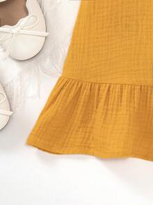 小女童貼花荷葉邊吊帶連衣裙