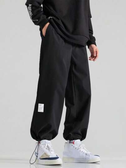 Guys Patched Detail Drawstring Hem Pants