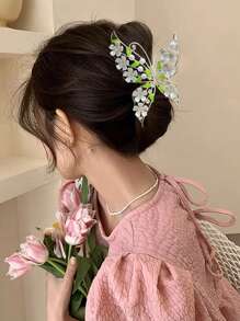 Garra de pelo con flor y mariposa - Dorado - Ver 1