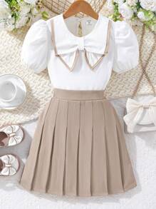 SHEIN Blouse Pour Fille Préadolescente À Manches Bouffantes Avec Garniture Contrastante Et Jupe Plissée