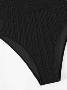 環鏈鏤空連體泳衣