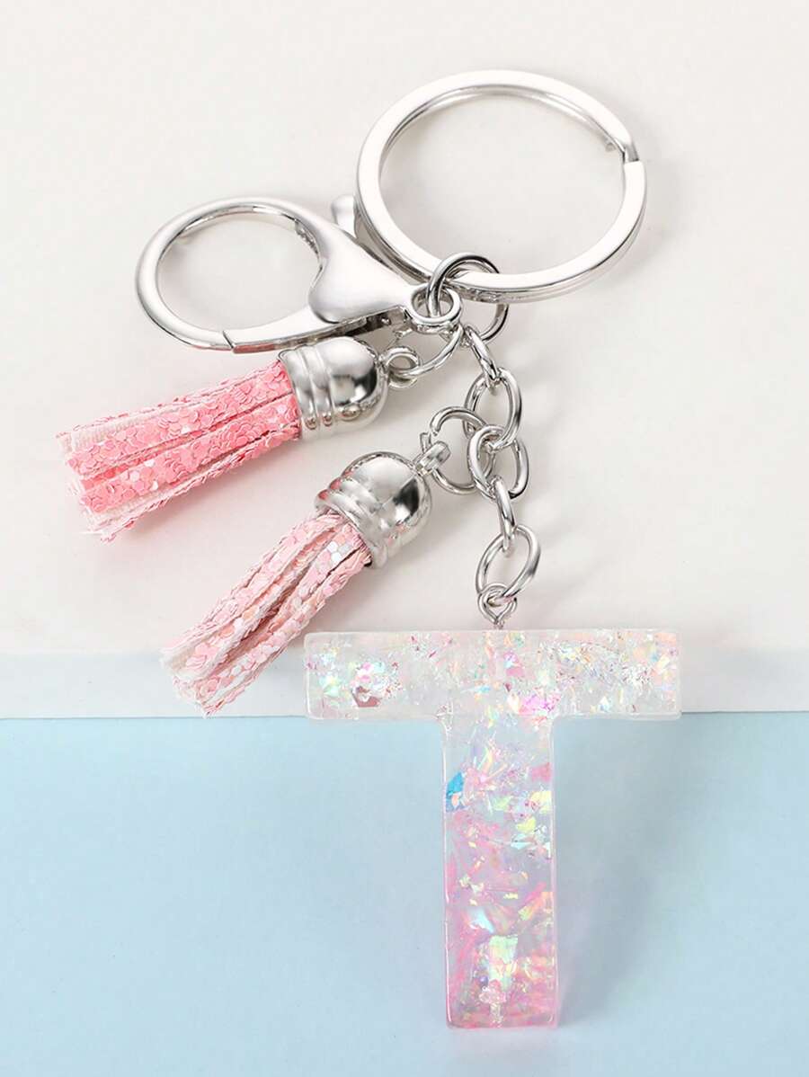 Móc khóa charm chữ & tua - Hồng - Xem 1