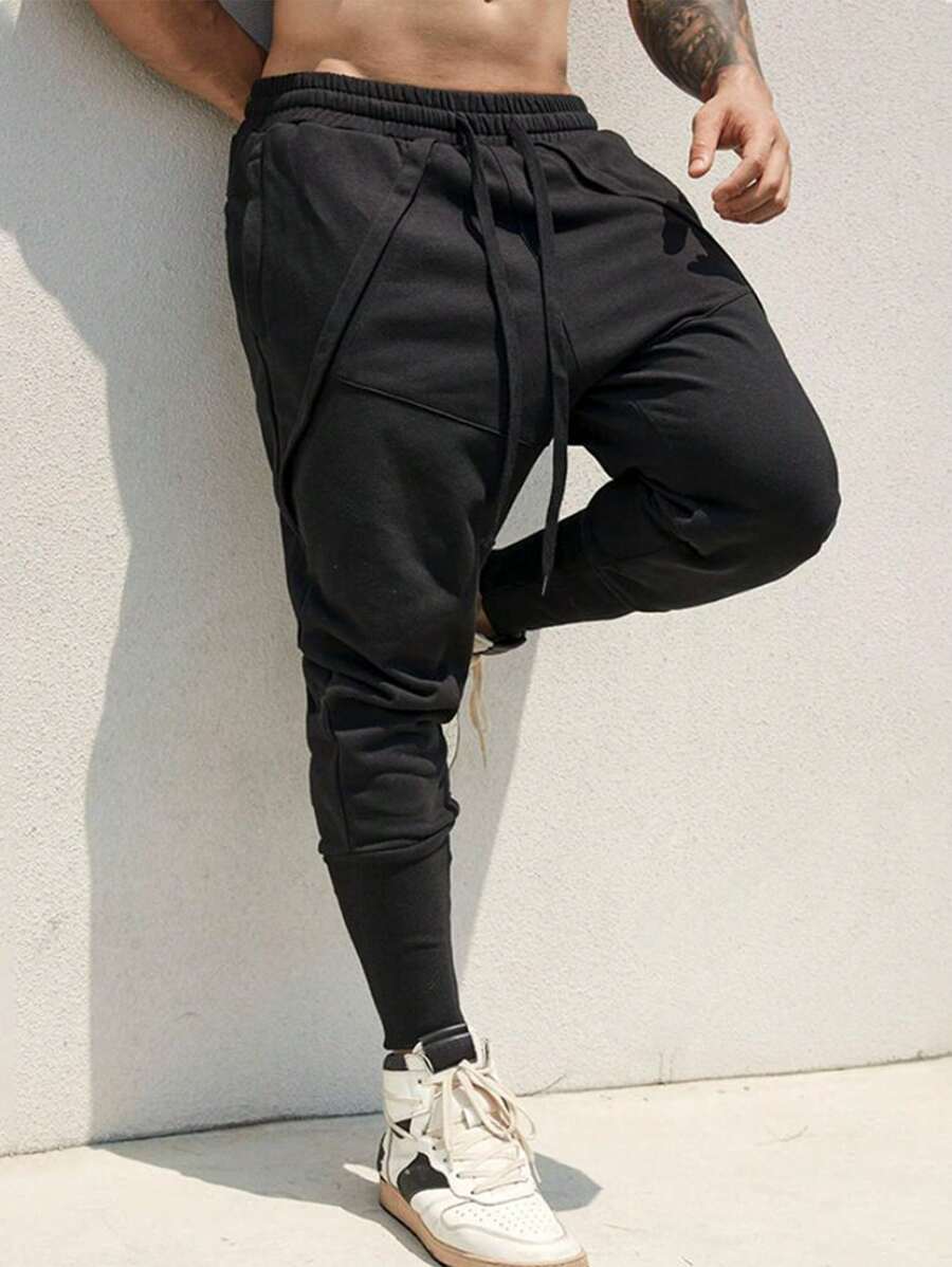 Manfinity Homme Quần nỉ dài dáng rộng màu trơn có dây rút eo dành cho nam, quần nỉ dài đơn giản, thoải mái khi đi chơi cùng chồng - màu đen - Xem 1