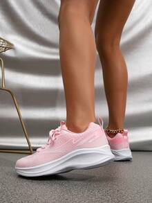 運動跑步鞋適用於女士勾織粉色前綁帶運動鞋