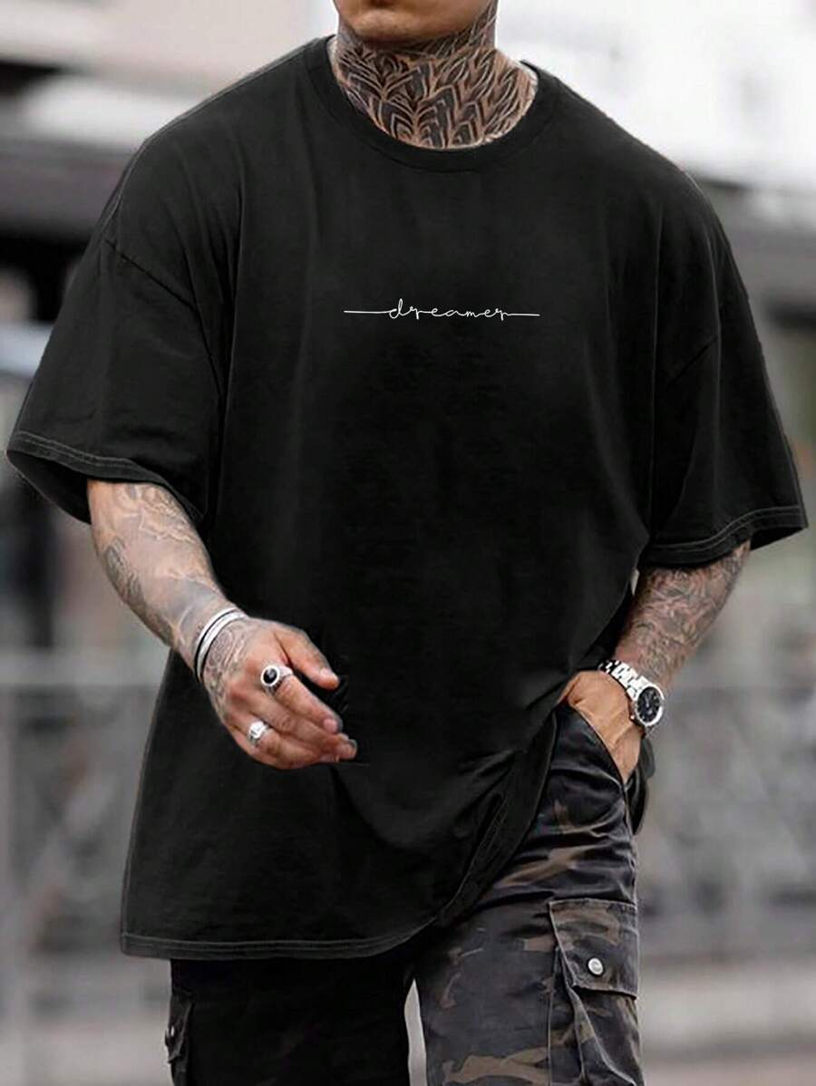 Manfinity LEGND Camiseta gráfica holgada y casual con letra para hombre, verano - Negro - Ver 1