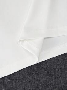 Manfinity Hypemode Camiseta holgada para hombre con bordado de dibujos animados y escote caído