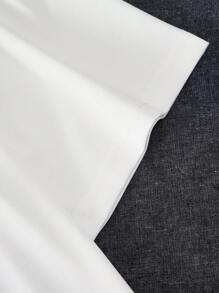 Manfinity Hypemode Camiseta holgada para hombre con bordado de dibujos animados y escote caído