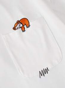 Manfinity Hypemode Camiseta holgada para hombre con bordado de dibujos animados y escote caído