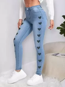 Pantalones ajustados con estampado de corazones