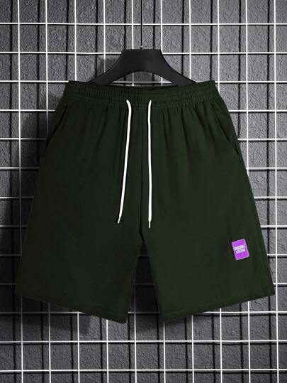 Manfinity Homme 男士休闲日常穿搭，非常适合外出度假，INS风高性价比宽松休闲短裤，字母贴布设计，腰部抽绳，抽绳休闲短裤