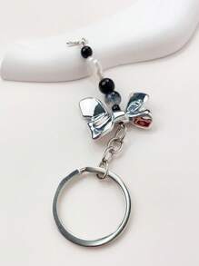 Mujer 1 pieza Llavero cruzado & lazo accesorio de moda para diariamente