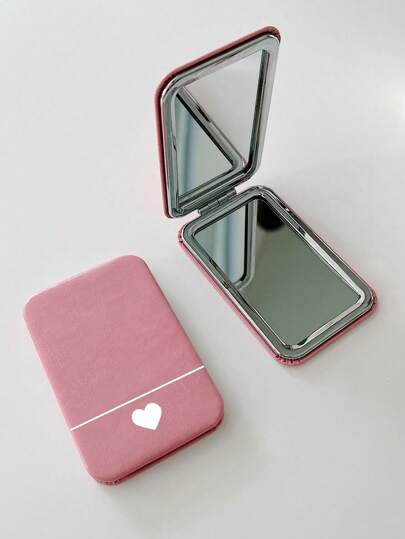 مرآة قابلة للطي بطباعة قلب