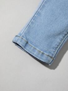 Bimba Jeans con vita elastica baffo di gatto lavato