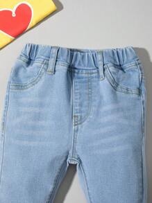 Bimba Jeans con vita elastica baffo di gatto lavato