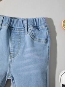 Bimba Jeans con vita elastica baffo di gatto lavato