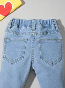 Bimba Jeans con vita elastica baffo di gatto lavato