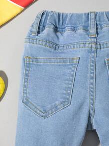 Bimba Jeans con vita elastica baffo di gatto lavato