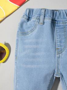 Bimba Jeans con vita elastica baffo di gatto lavato